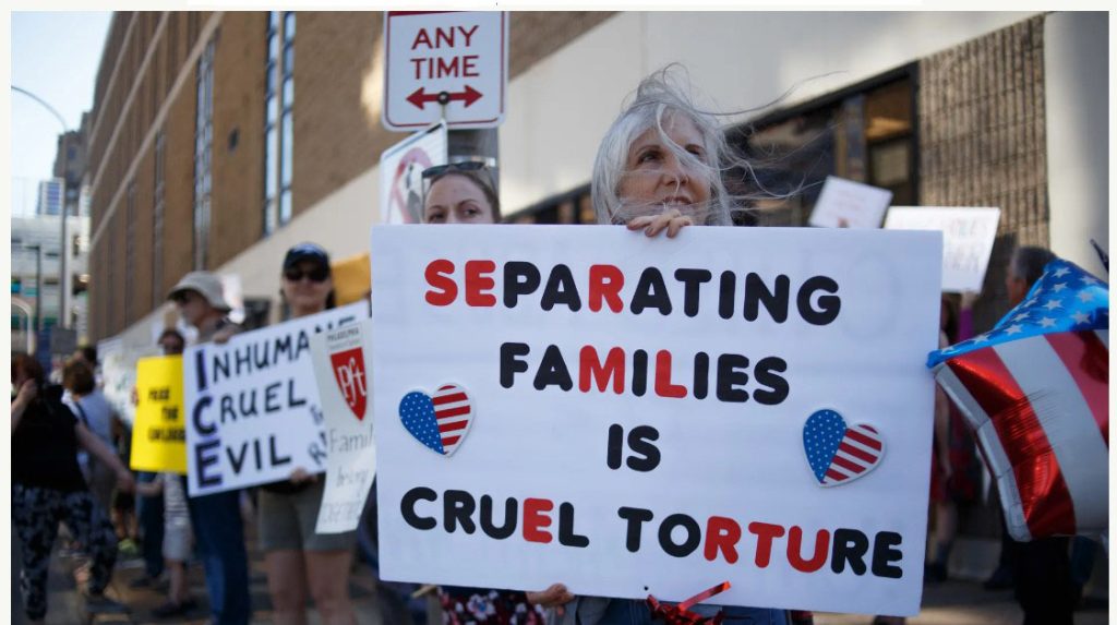 Separation Protest or Awareness Campaign: Image: Demonstrators holding signs advocating against family separation.