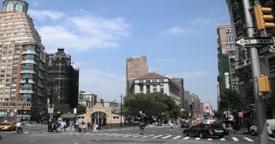 Looking northward on Broadway toward 72nd Street in Verdi Square, New York City. The New York City Subway's 72nd Street station house can be seen at left.